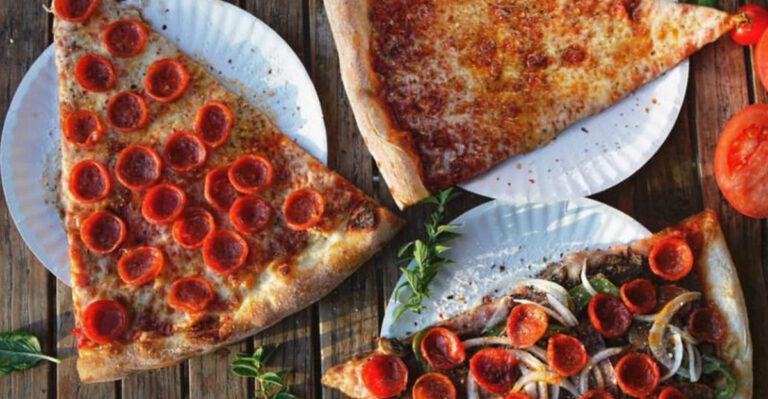 These 10 Florida Pizza Joints Serve Slices Bigger Than the Plate