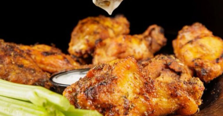 This Dania Beach Hotspot Serves Championship Wings With a Side of Tiki Bar Charm