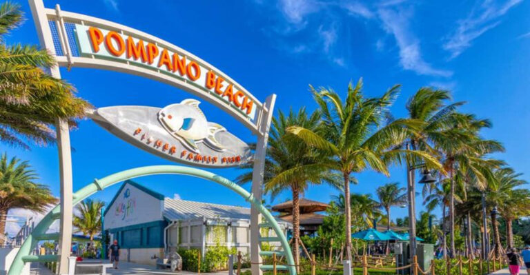 This Open-Air Florida Beach Bar Sits Beneath a Giant Thatched Palapa at the Base of a 900-Foot Pier