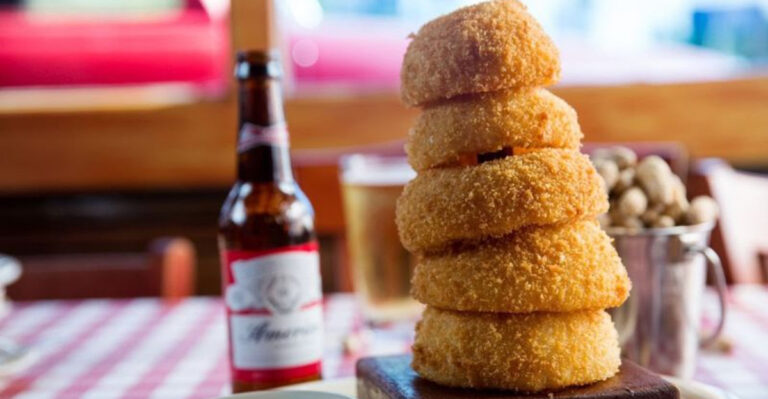 We Found 12 Florida Chains Where Crispy Onion Rings Steal The Entire Show