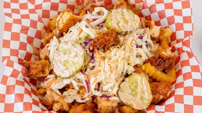 Do not overlook the fries, slaw, and sauces