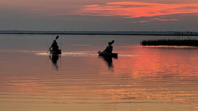 Kayaking Through Glass-Calm Bay Waters