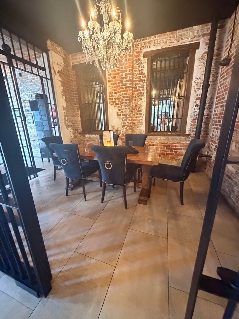 Actual Jail Cells Converted Into Intimate Dining Spaces