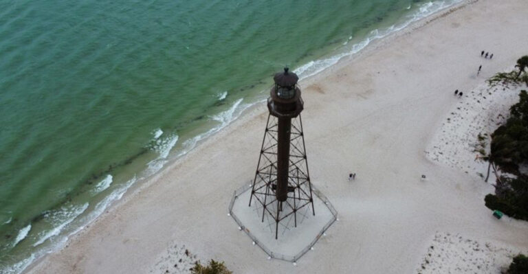 The Most Stunning Beach In Florida Has Shells, Turquoise Water, And Lighthouse Views