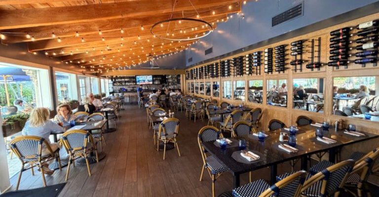 This Florida Restaurant Serves Signature Truffle Oil Pizza in a Magical Outdoor Courtyard