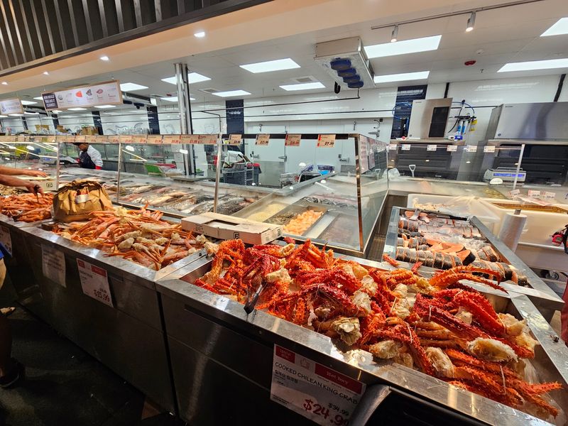 Seafood Section With Swimming Lobsters and Fresh Catches