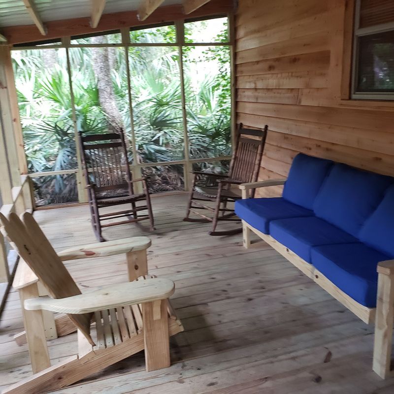 Cedar Cabins With Rocking Chairs Set The Pace