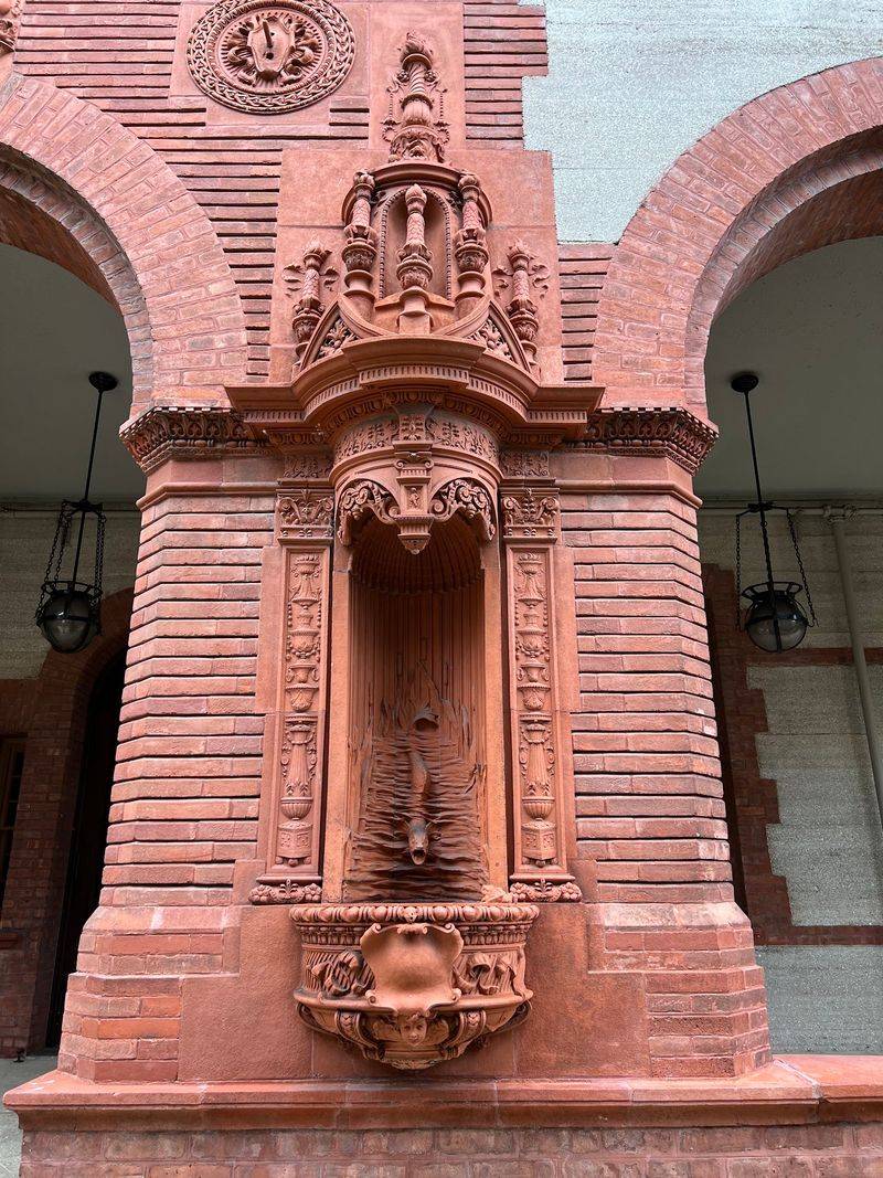 A Courtyard Fountain With Frogs And Turtles Keeps Watch
