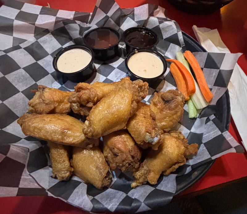 This Miramar Beach Favorite Turns Wings and TV Time Into the Main Event
